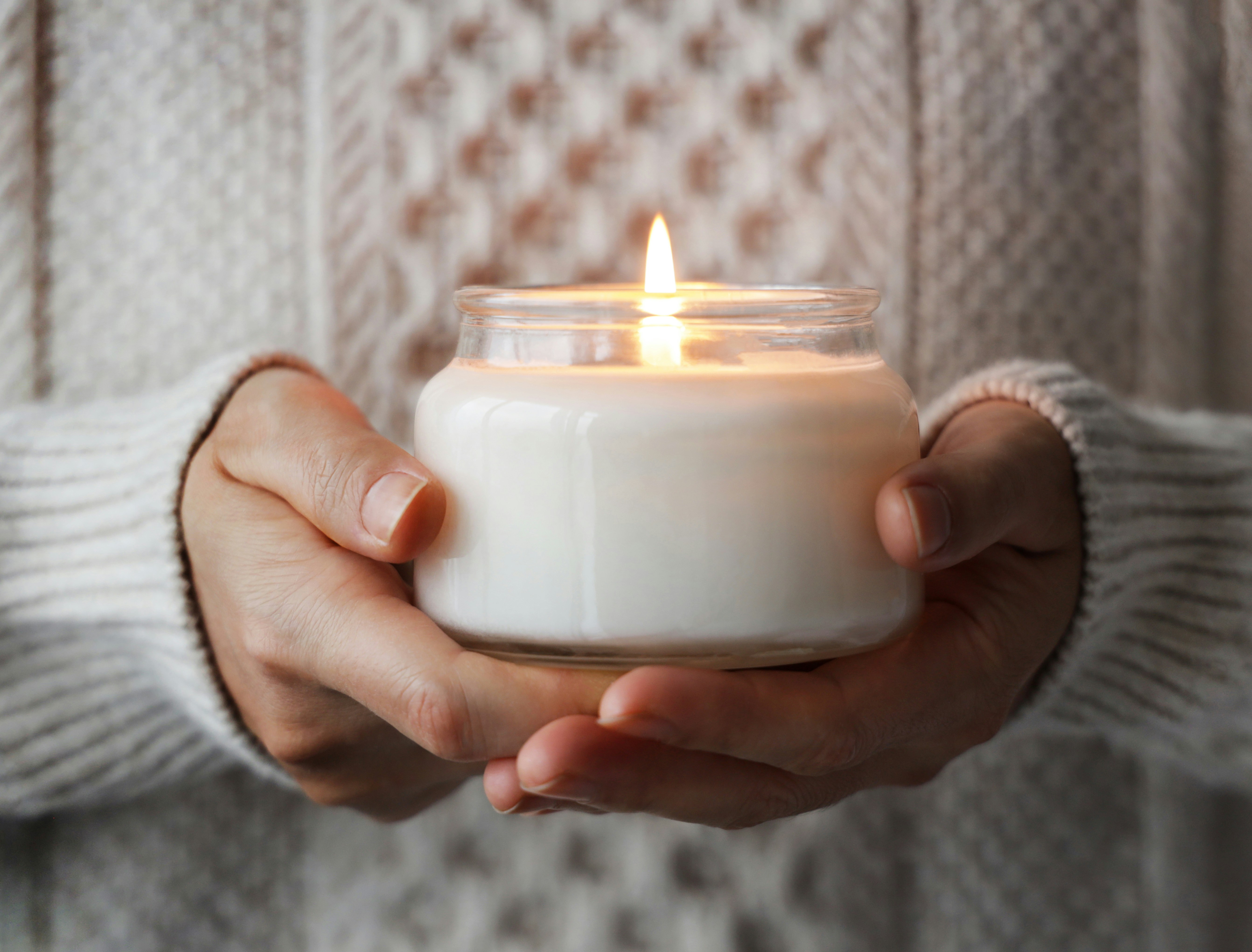 Warm candle, welcoming therapy space